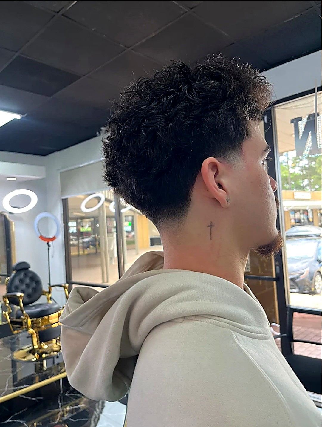 Taper fade on curly hair at Top Barber Tomball